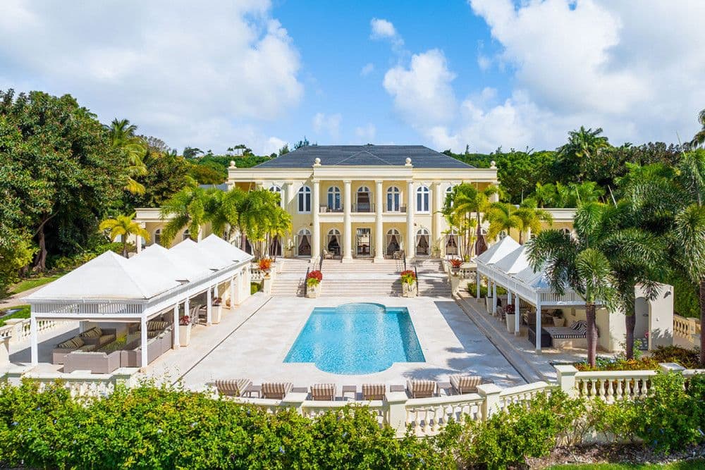 The Ridge's neo-classical main house and central pool by day in St Peter, Barbados
