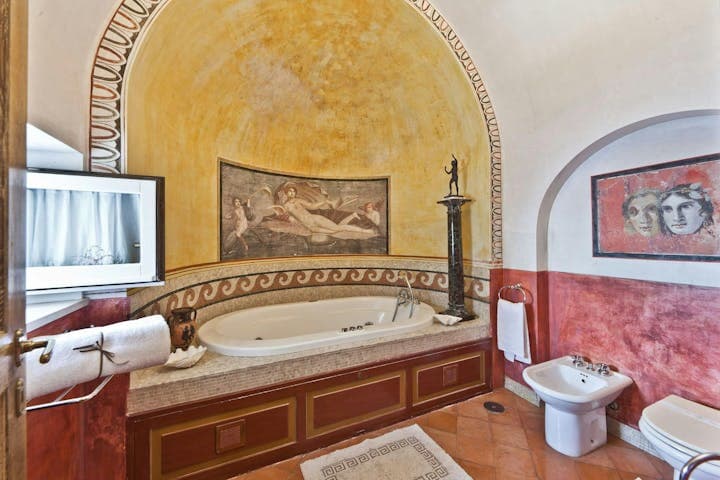 Summer in Praiano master bathroom with Roman frescoes and golden dome, Praiano, Amalfi Coast, Italy