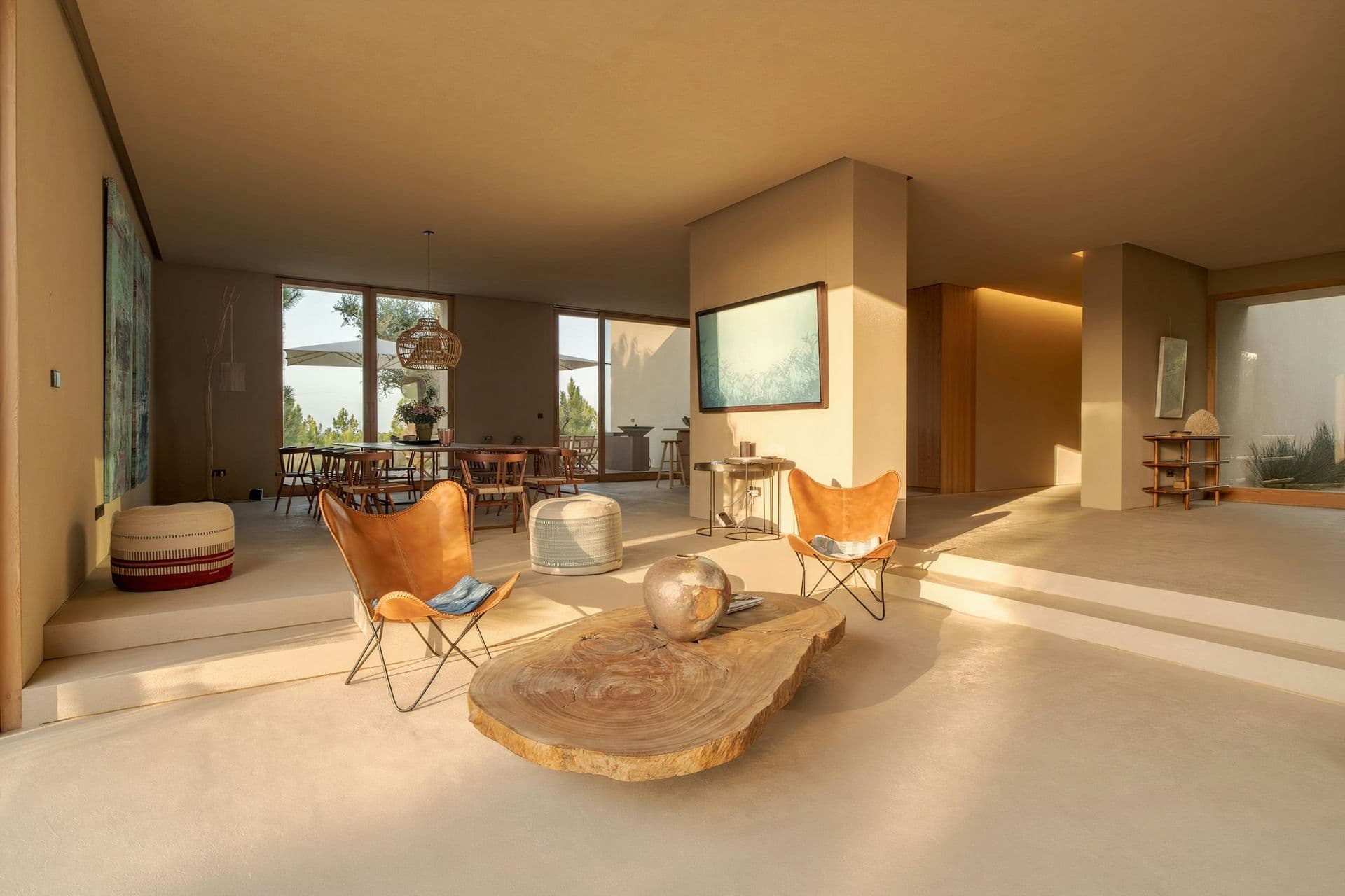 Open-plan living and dining space opening to the deck at Mighty Pine