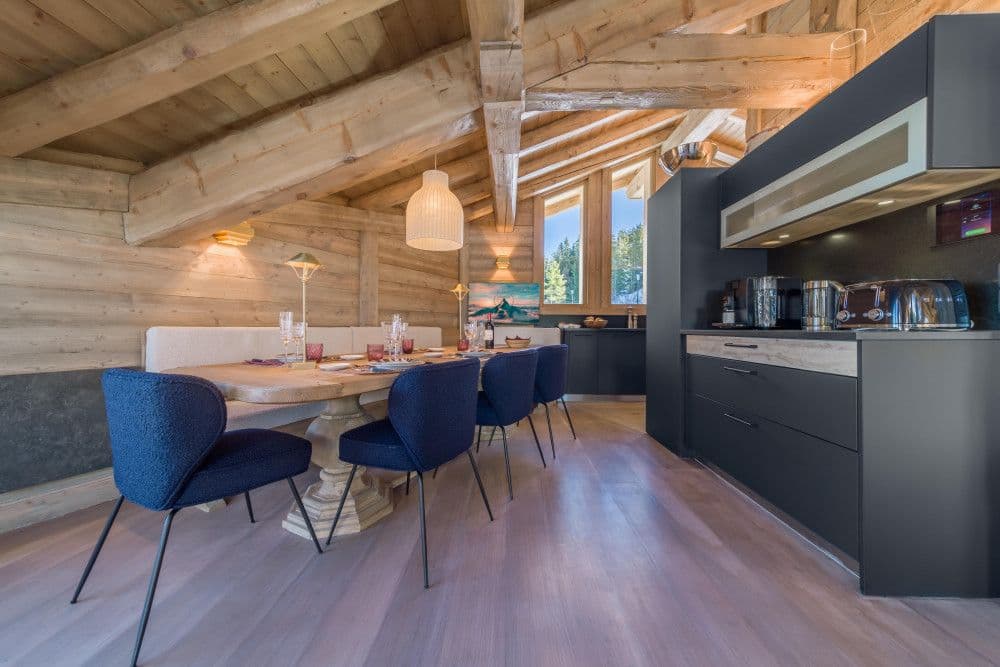 Dining area and open kitchen at Courchevel 13