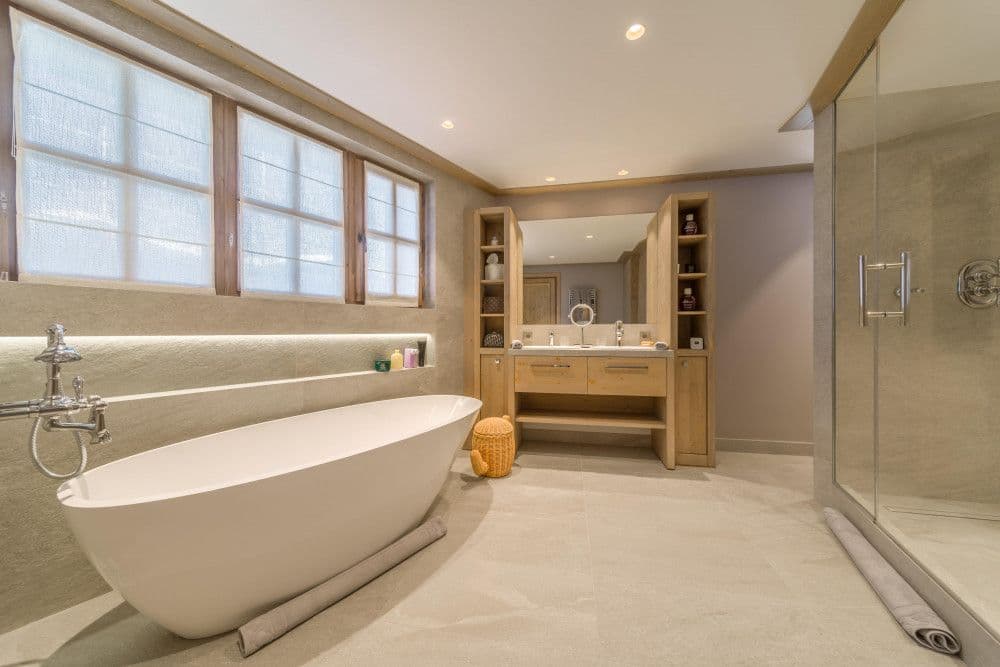 Master bathroom with a freestanding bath at Courchevel 13