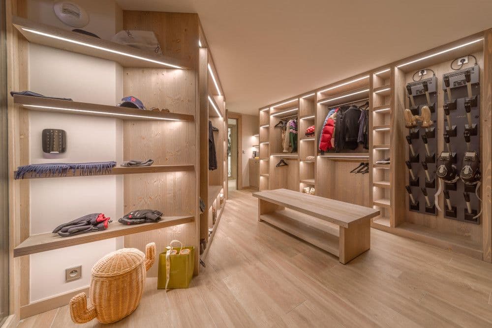 Ski room with boot warmers and racks at Courchevel 13