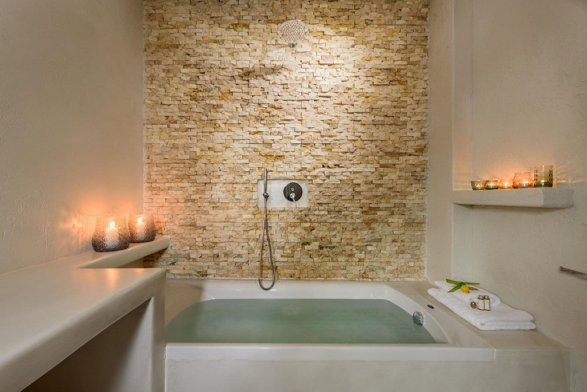 Freestanding bath with candlelight at Gaia's Rest.