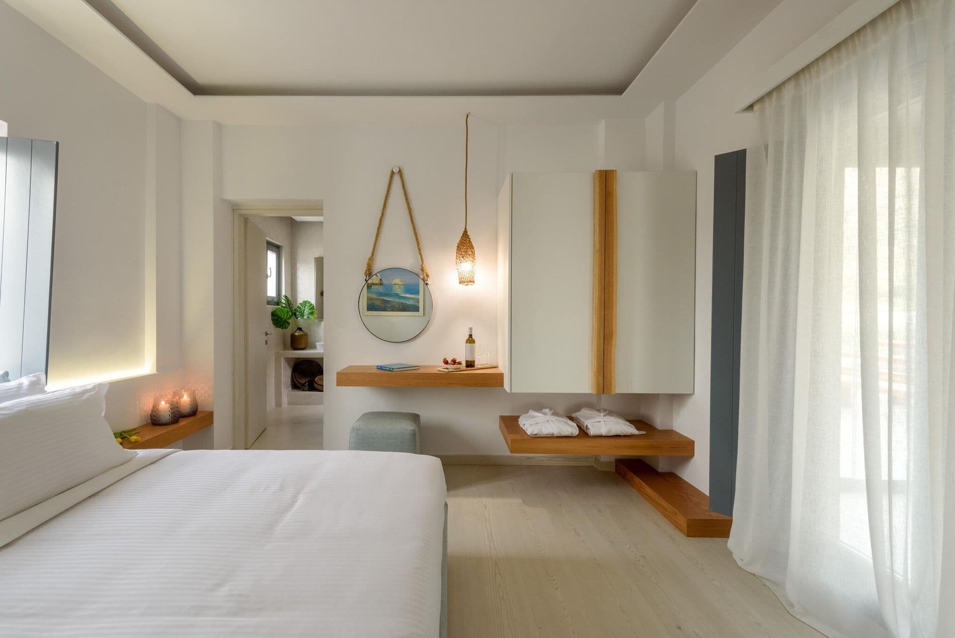 A calm, minimalist bedroom at Gaia's Rest.