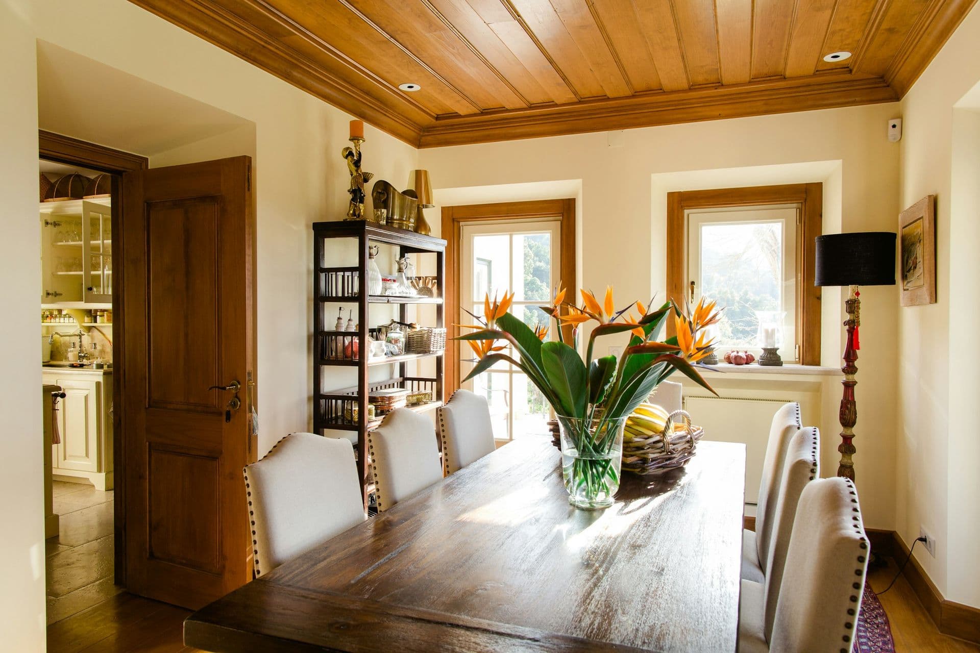 Indoor dining room with a long wooden table at Romantic Outlook, Sintra