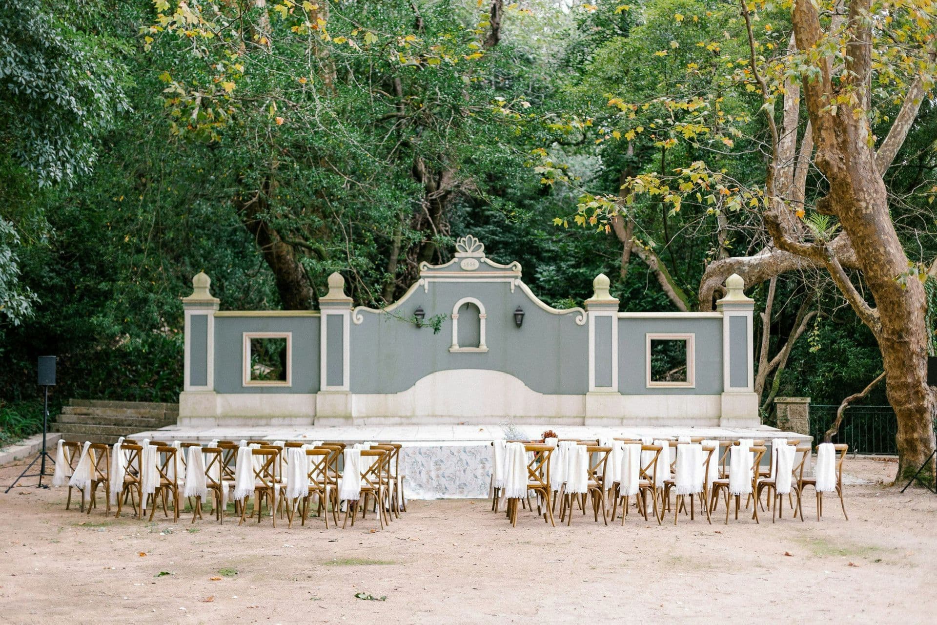 Ornamental garden terrace set for a long banquet at Romantic Outlook, Sintra