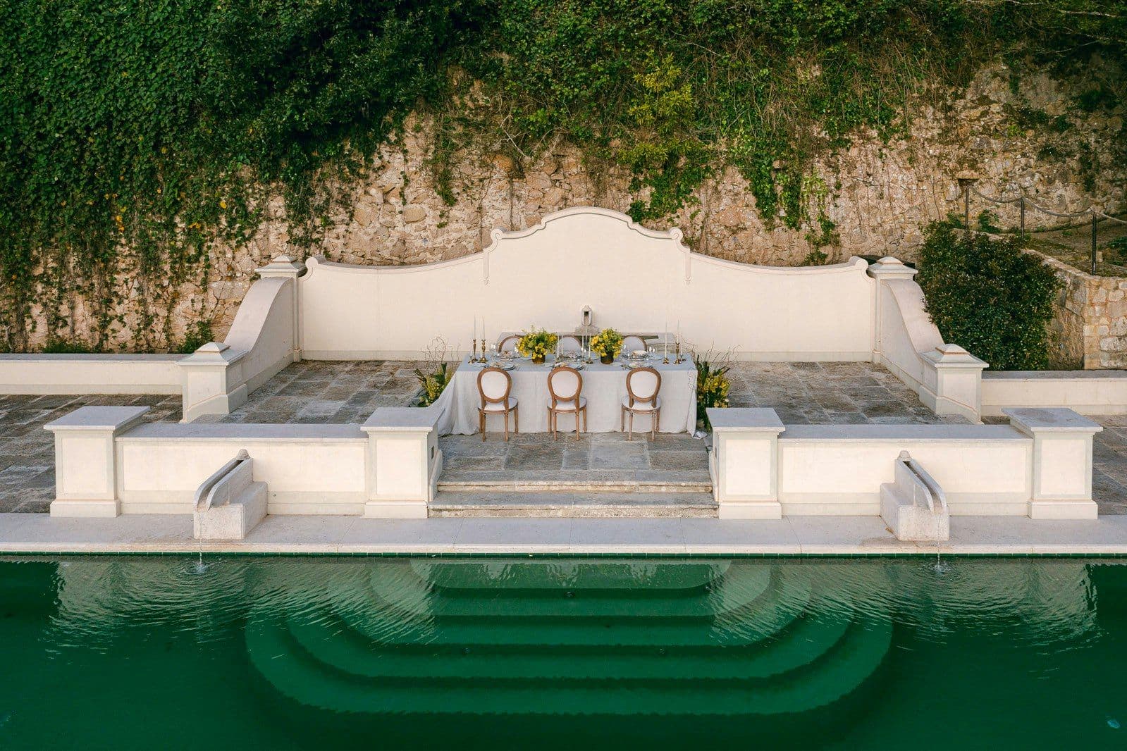 Second garden pool with a formal seating alcove at Romantic Outlook, Sintra