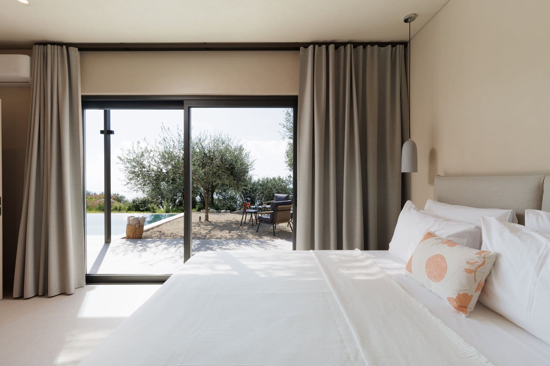 Double bedroom with sliding doors to the pool terrace at Corfu Dreams, Corfu