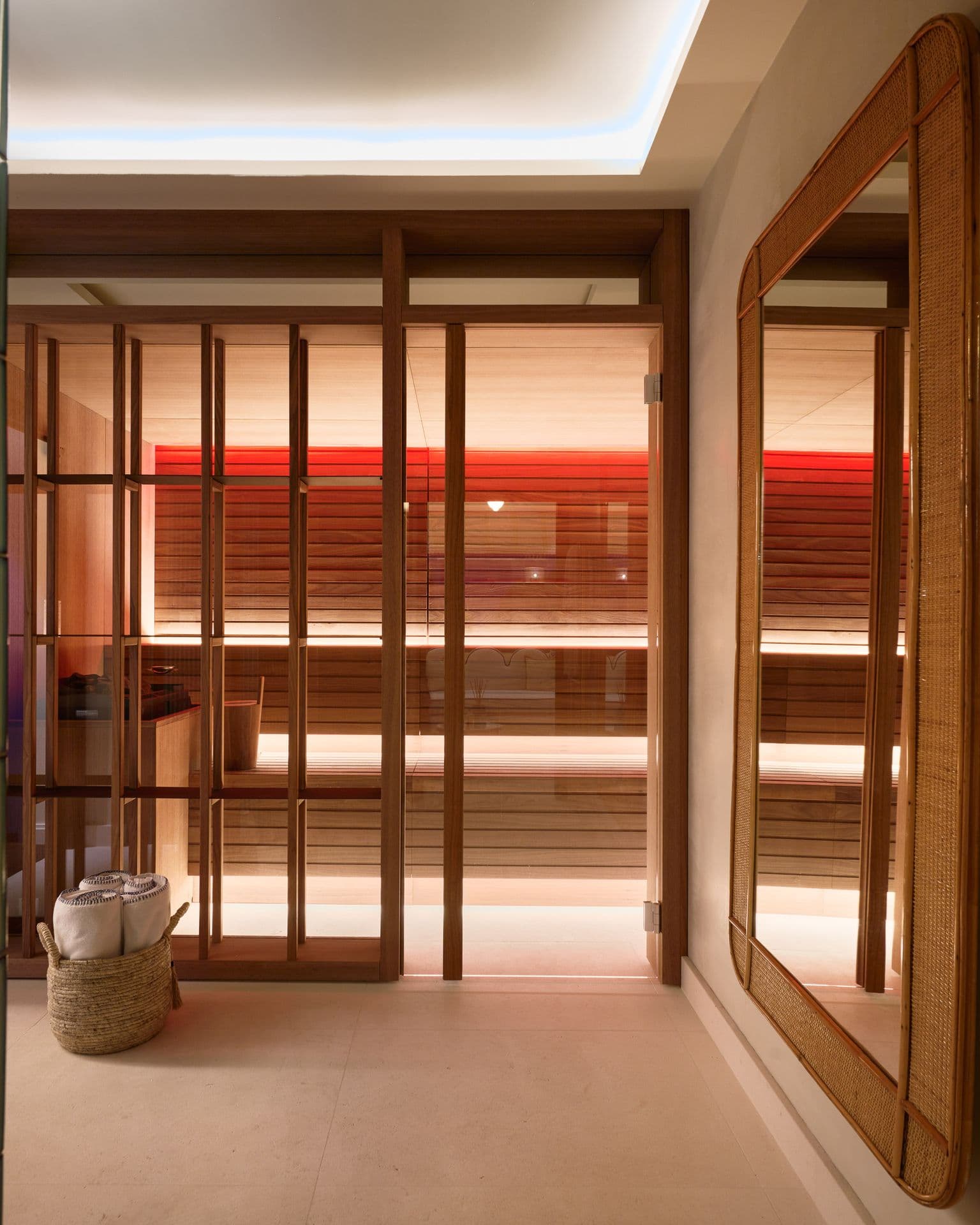 A wood panelled corridor leading to the villa's sauna and wellness area