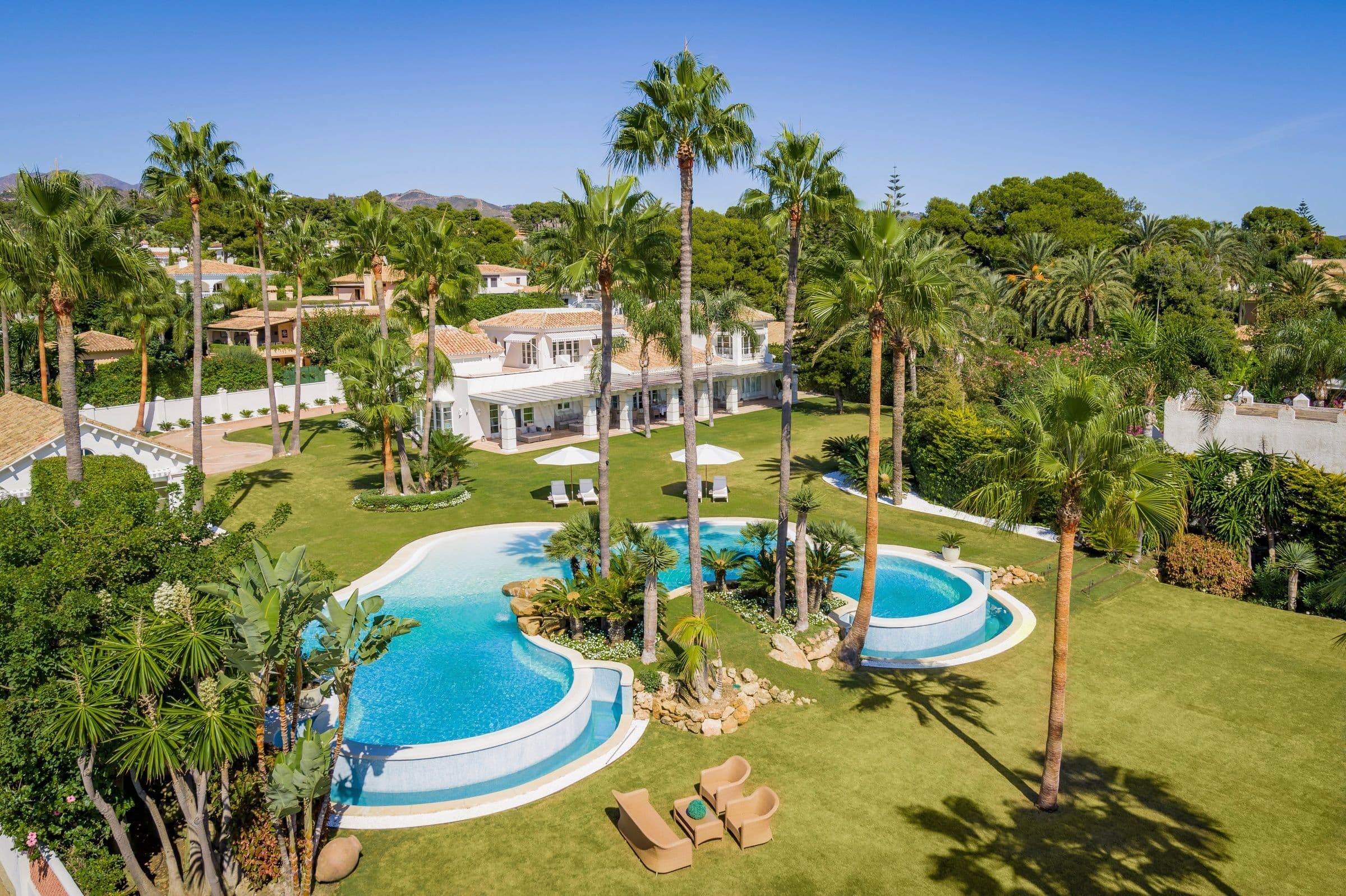 Villa Tesoro aerial view of beachfront estate with mountain backdrop, Marbella, Andalusia, Spain