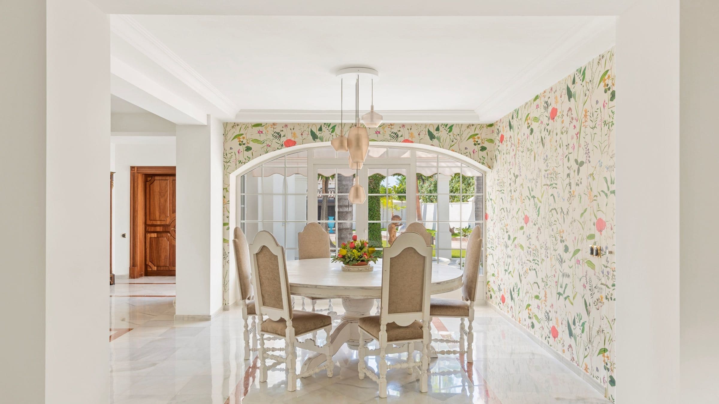 Villa Tesoro living room with exposed beams and pool terrace access, Marbella, Spain