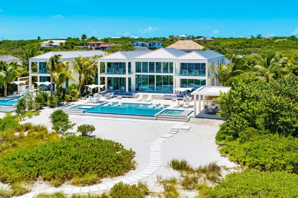 Aerial view of Seaclusion, its pool and beach path on Providenciales