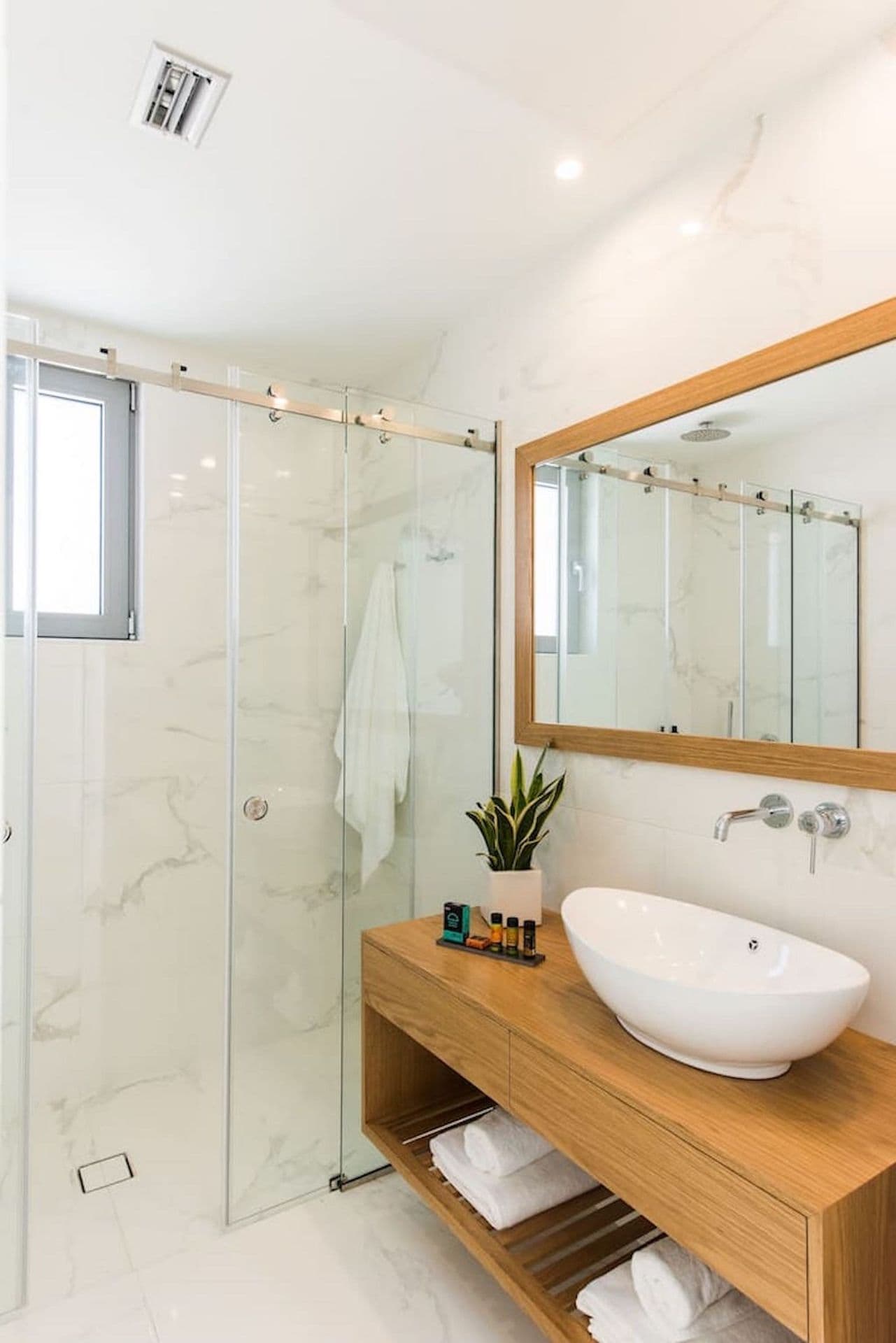 Double bedroom with a walk-in wardrobe and sea-view terrace doors at Back to the Sea, Greece