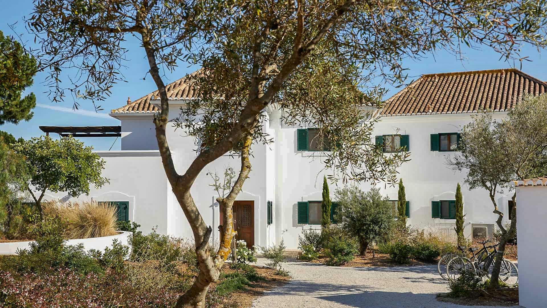 Wild Peace traditional white-washed villa exterior with terracotta roof, Tavira, Algarve, Portugal