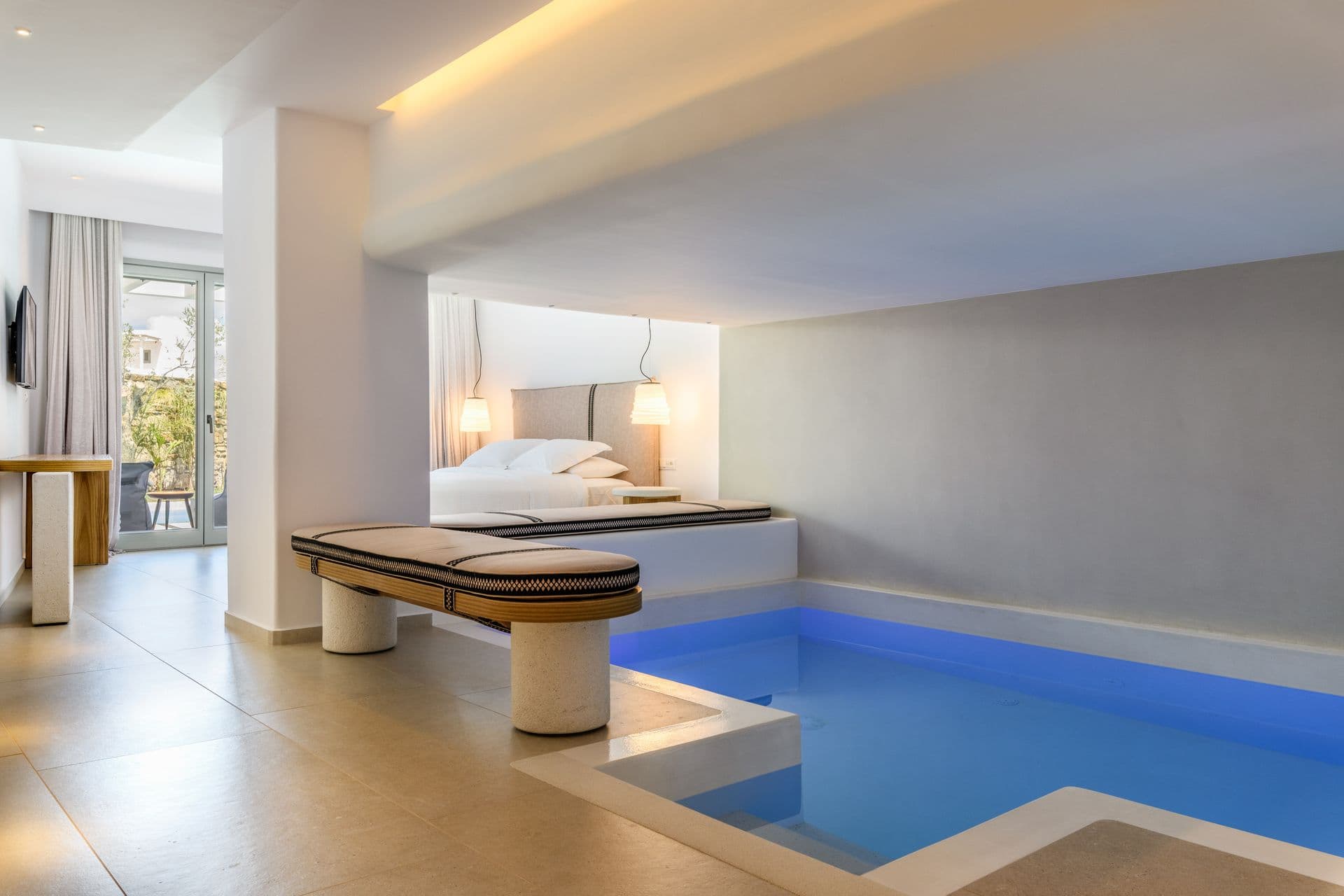 Bedroom suite with an indoor plunge pool at Cycladic Sunset Stay, Mykonos