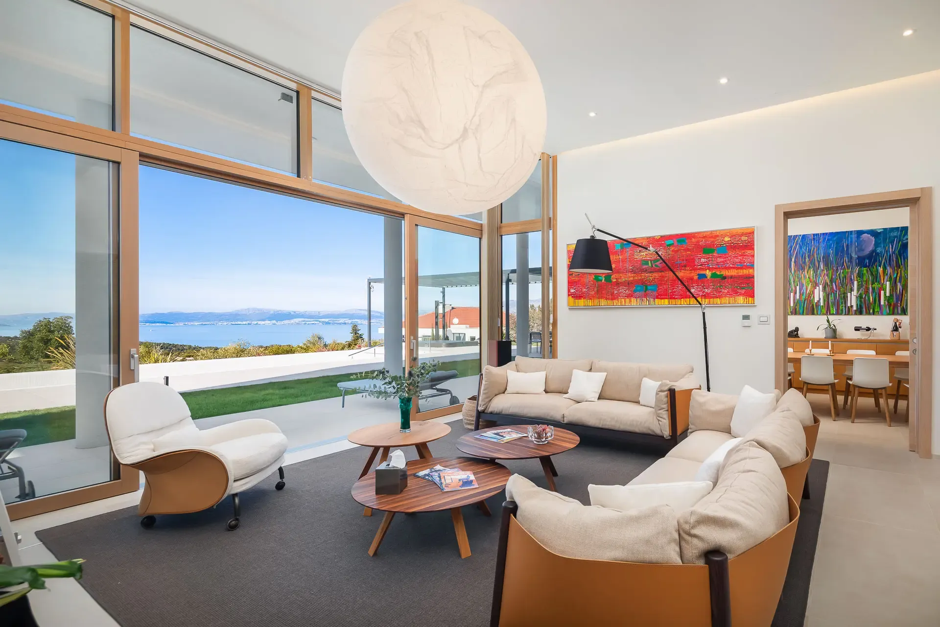 Living room seating at Highland Avenue looking out toward the sea.