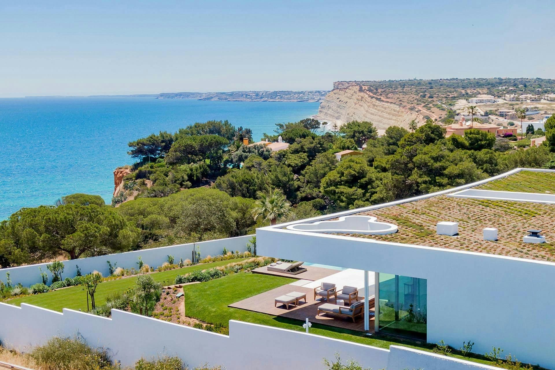 Aerial view of the villa on the cliffs above the sea near Lagos at A Coastal Crown