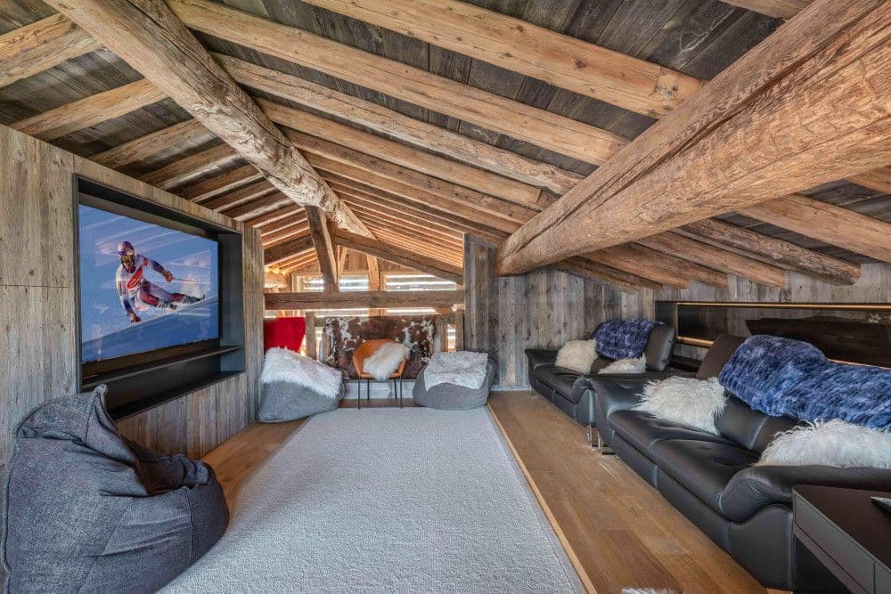 Media lounge beneath old beams at Megeve Centre 7