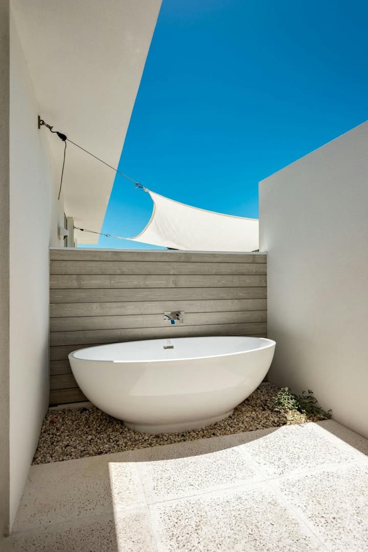 Atlantic Ocean Retreat outdoor bathroom with freestanding tub, Leeward Settlement, Turks and Caicos Islands
