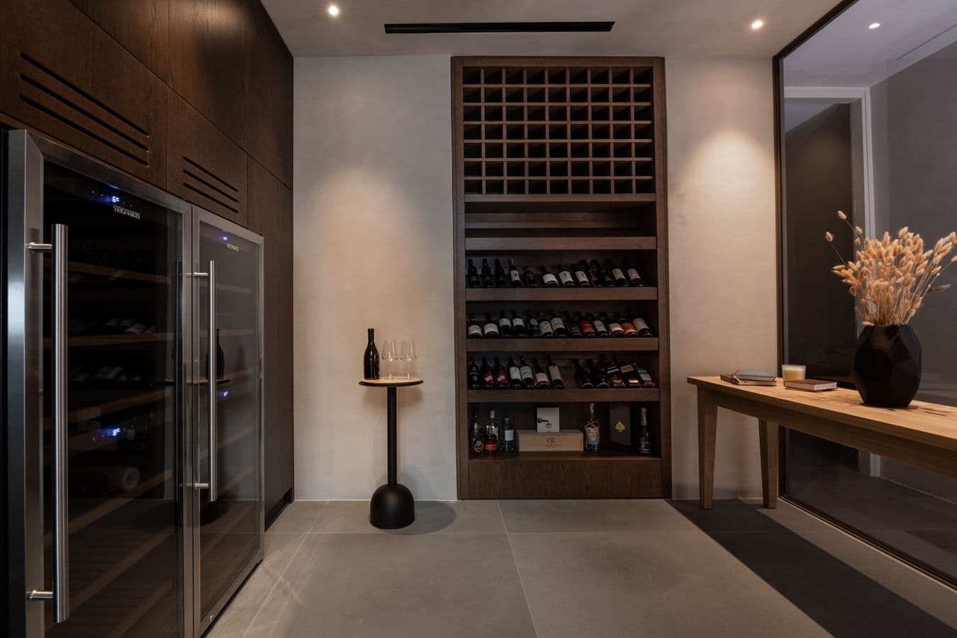 Wine storage wall and display shelving in a hallway nook