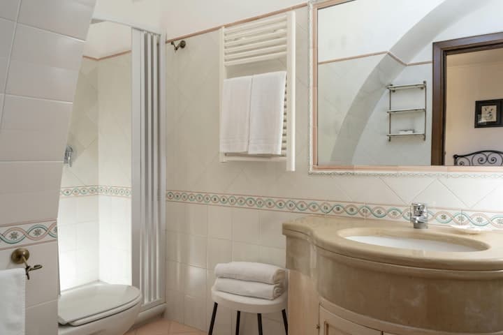 Sunny Positano Vista guest bathroom with ceramic tiles and basin vanity, Positano, Amalfi Coast, Italy