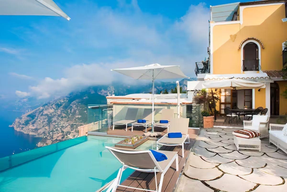 Sunny Positano Vista villa exterior with infinity pool and terraced patios, Positano, Amalfi Coast, Italy