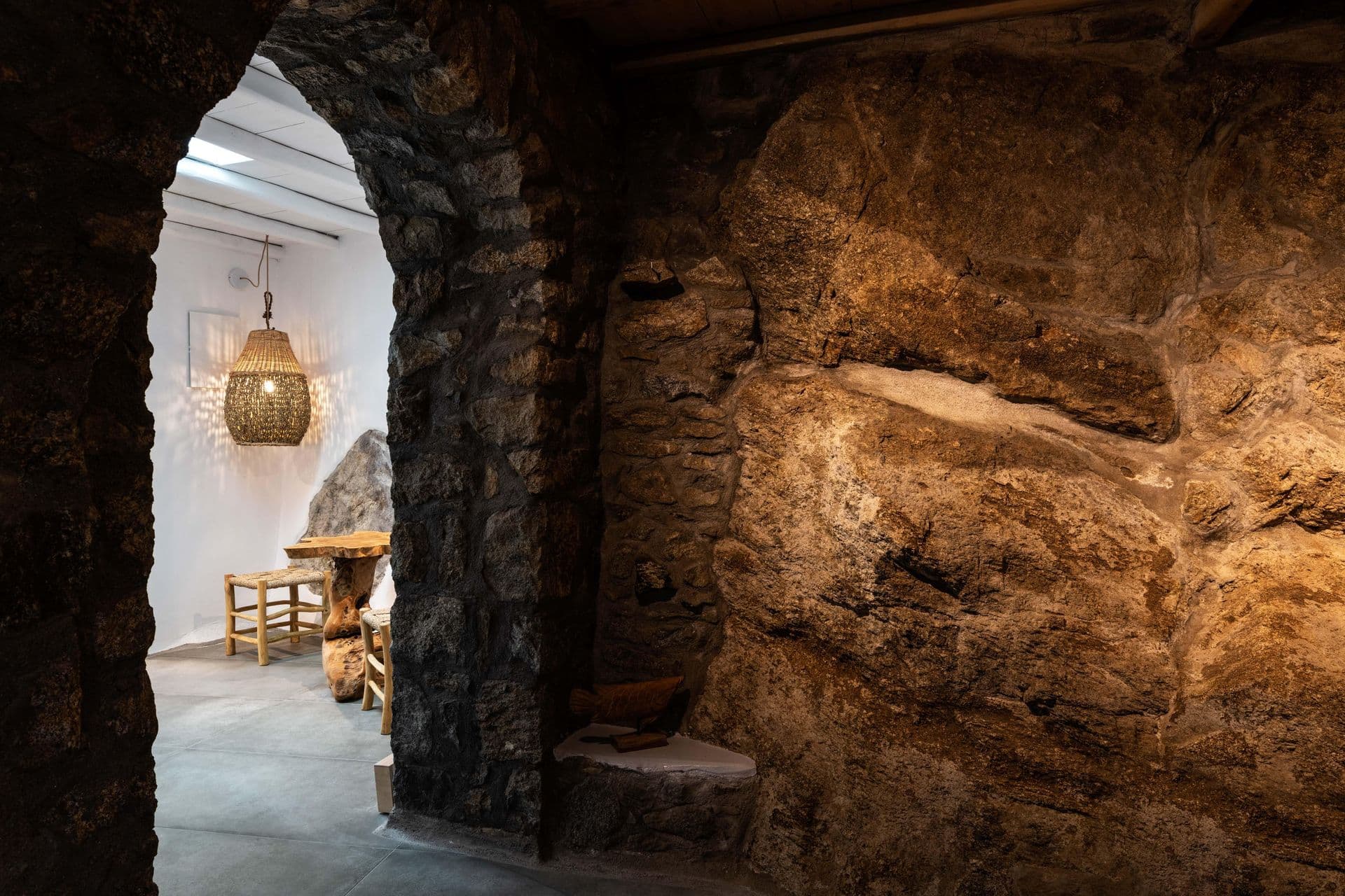 Unique carved stone cave-style room at Party Invitation villa