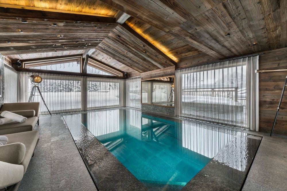 Indoor pool under a glazed roof at Mont d'Arbois 4