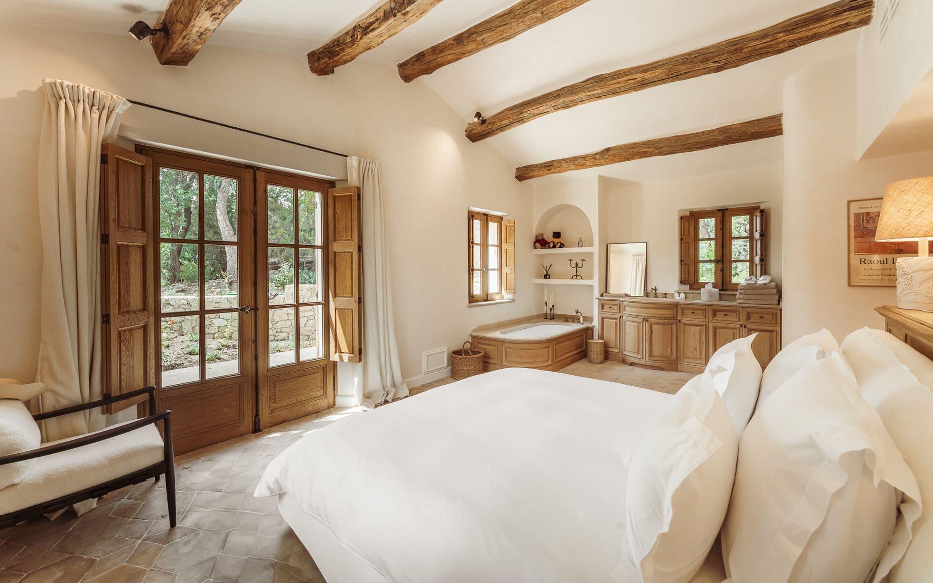 Bedroom with French doors opening onto a private terrace
