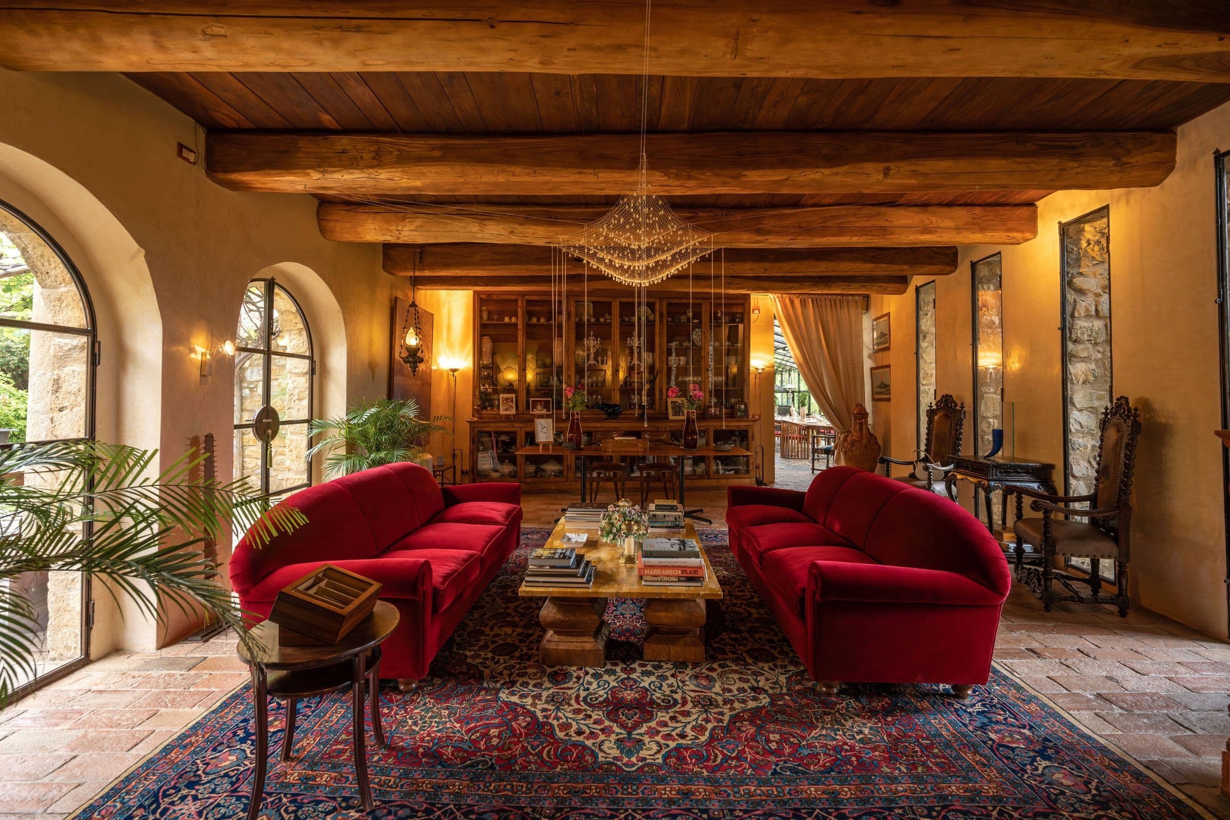 Villa Fortaleza grand salon with beamed ceilings and fireplace, Province of Grosseto, Tuscany, Italy