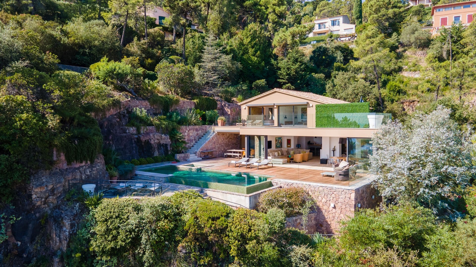 Modern villa with an infinity pool on the red Esterel rock above the sea at Coastal Azure, Theoule-sur-Mer