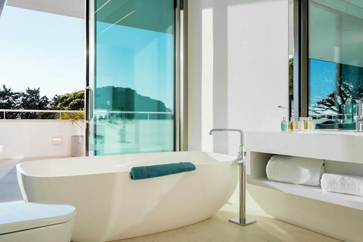 Atlantic Blues master bathroom with freestanding tub and Atlantic views, Lagos, Portugal