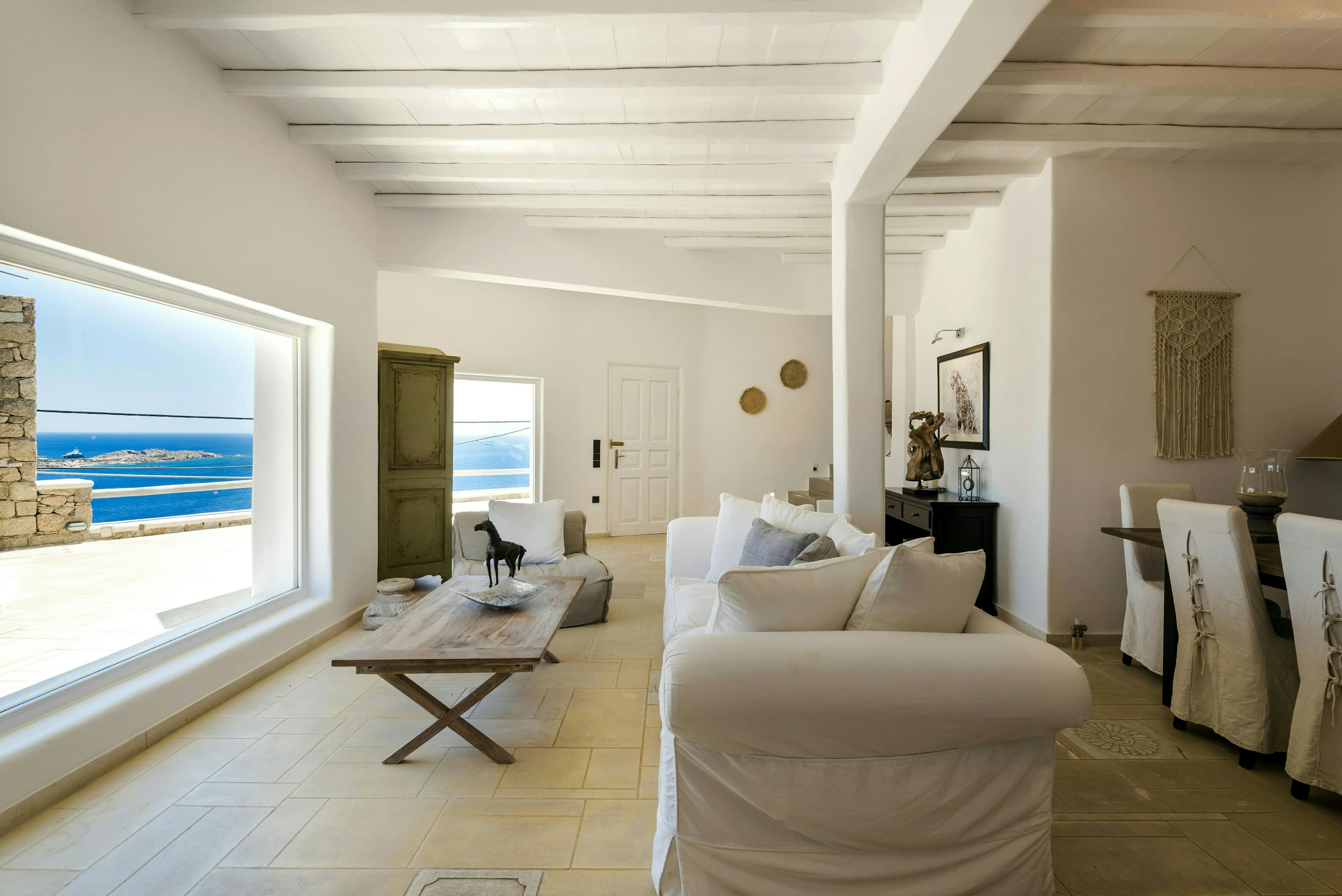 Heart Full villa living room with vaulted ceilings and sea views, Mykonos, Greece
