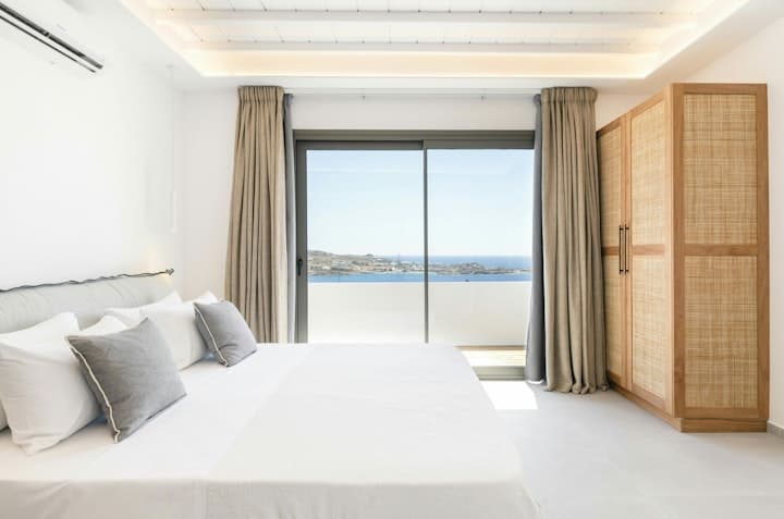 Heart Full villa master bedroom with private terrace access, Mykonos, Greece