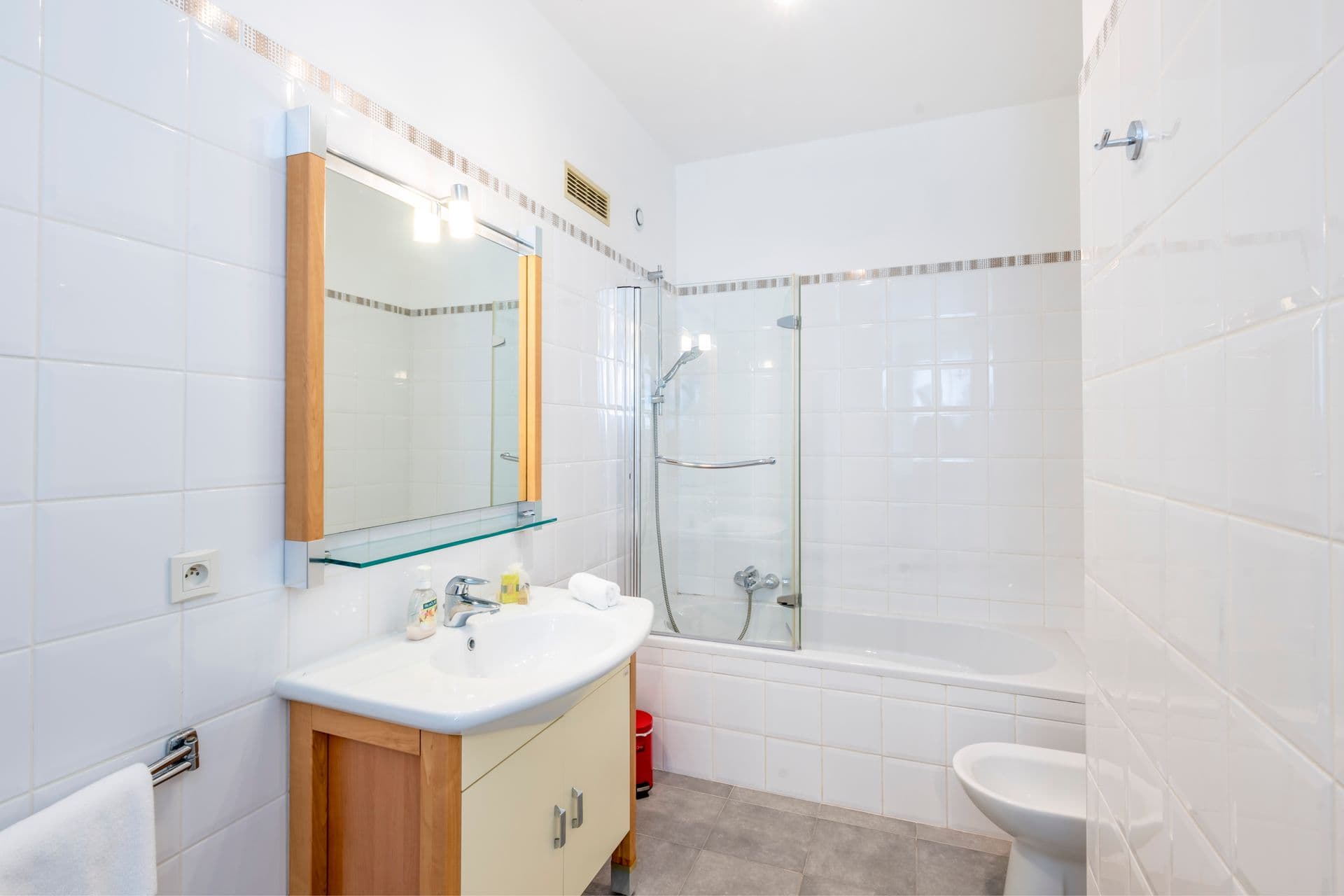 Bathroom vanity with mirror at Olive and Sea