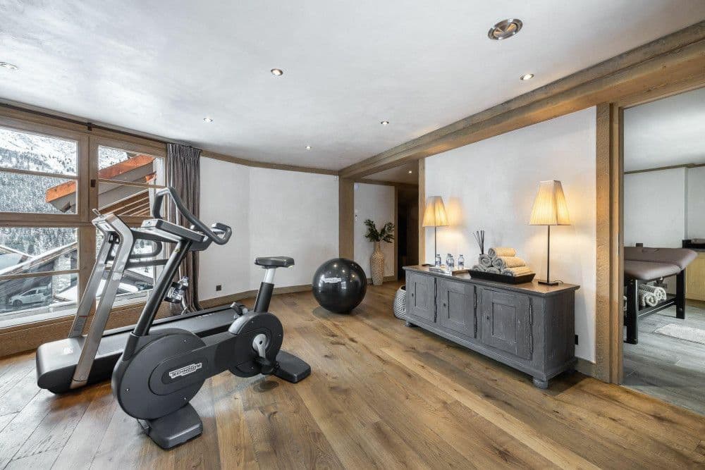 Home gym with cardio equipment at Meribel 139