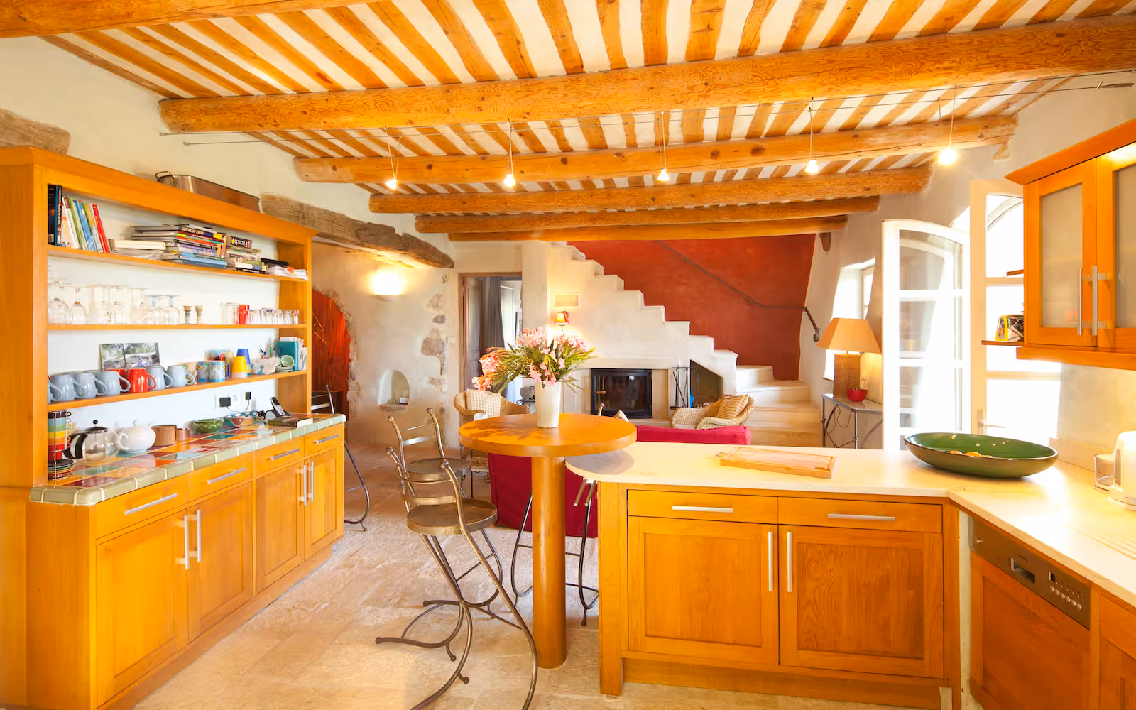 Farmhouse kitchen in cherry wood with a breakfast bar at Choral Words, Var, Provence