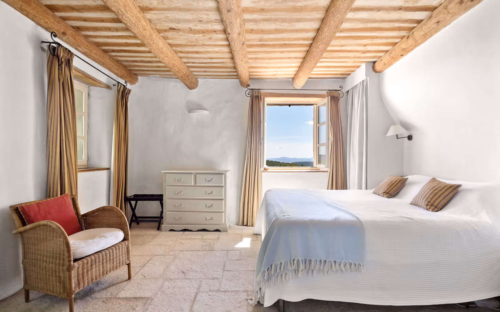 Beamed white bedroom with a window onto the valley at Choral Words, Var, Provence