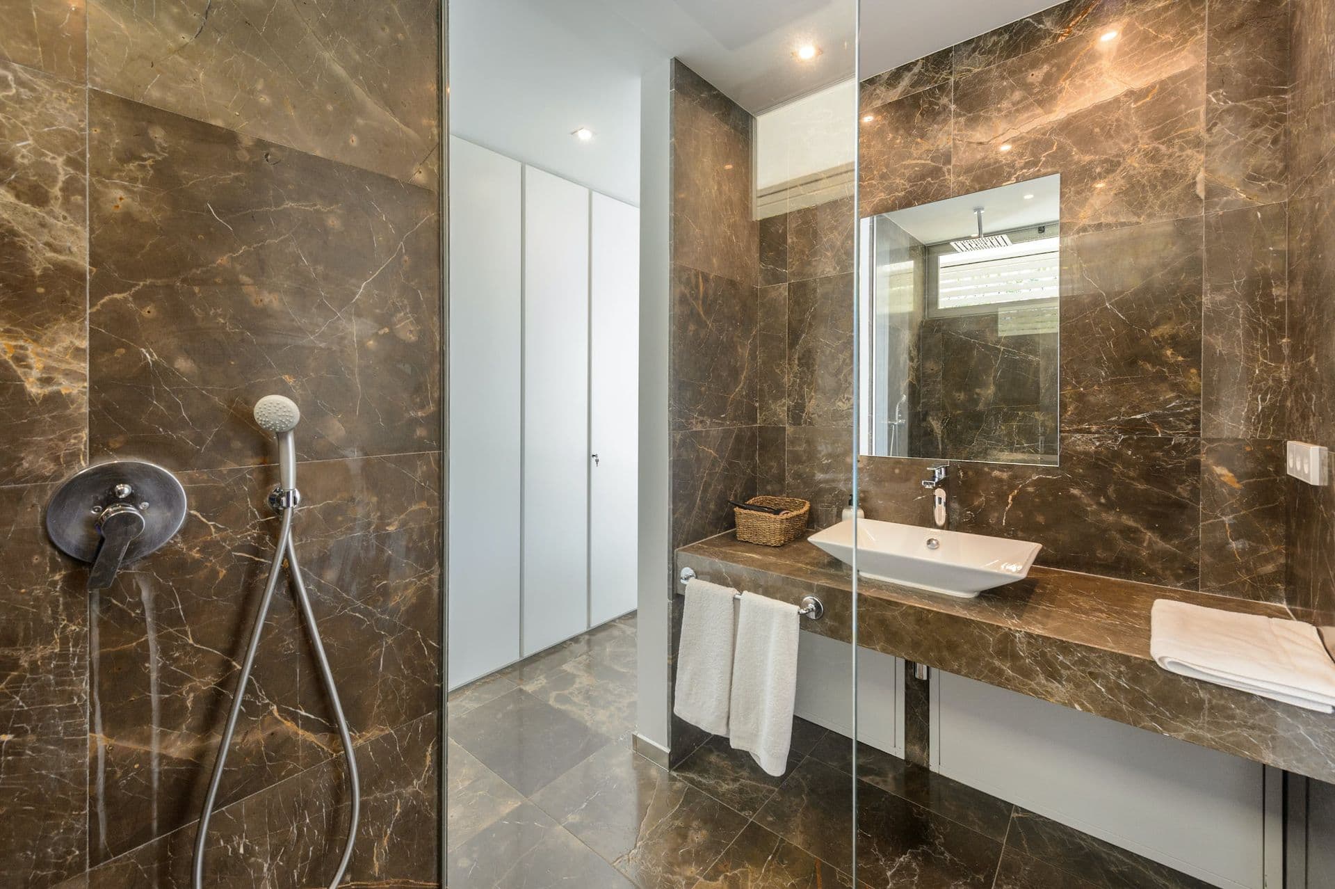 Marble bathroom with a walk-in rainfall shower