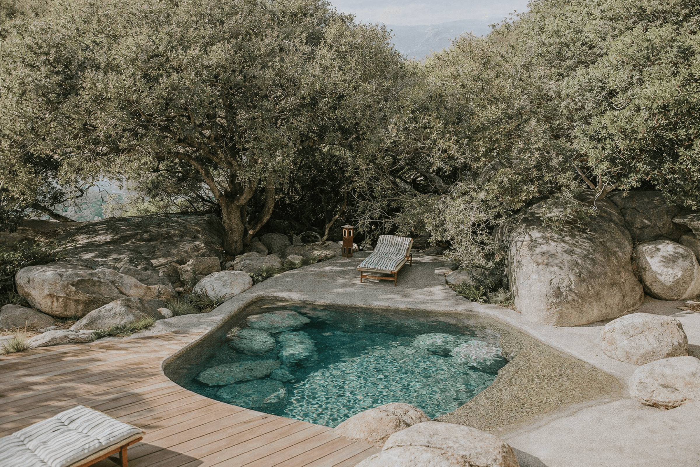 Casa Rossa villa exterior with organic natural pool and olive trees, Porto-Vecchio, Corsica, France