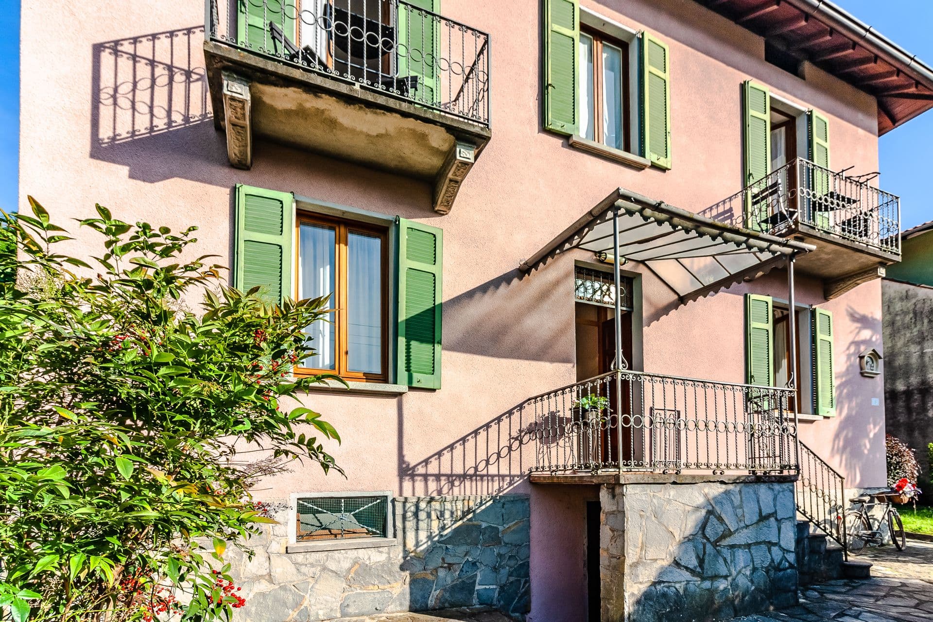 Stone entrance staircase and balcony at So Bellagio villa
