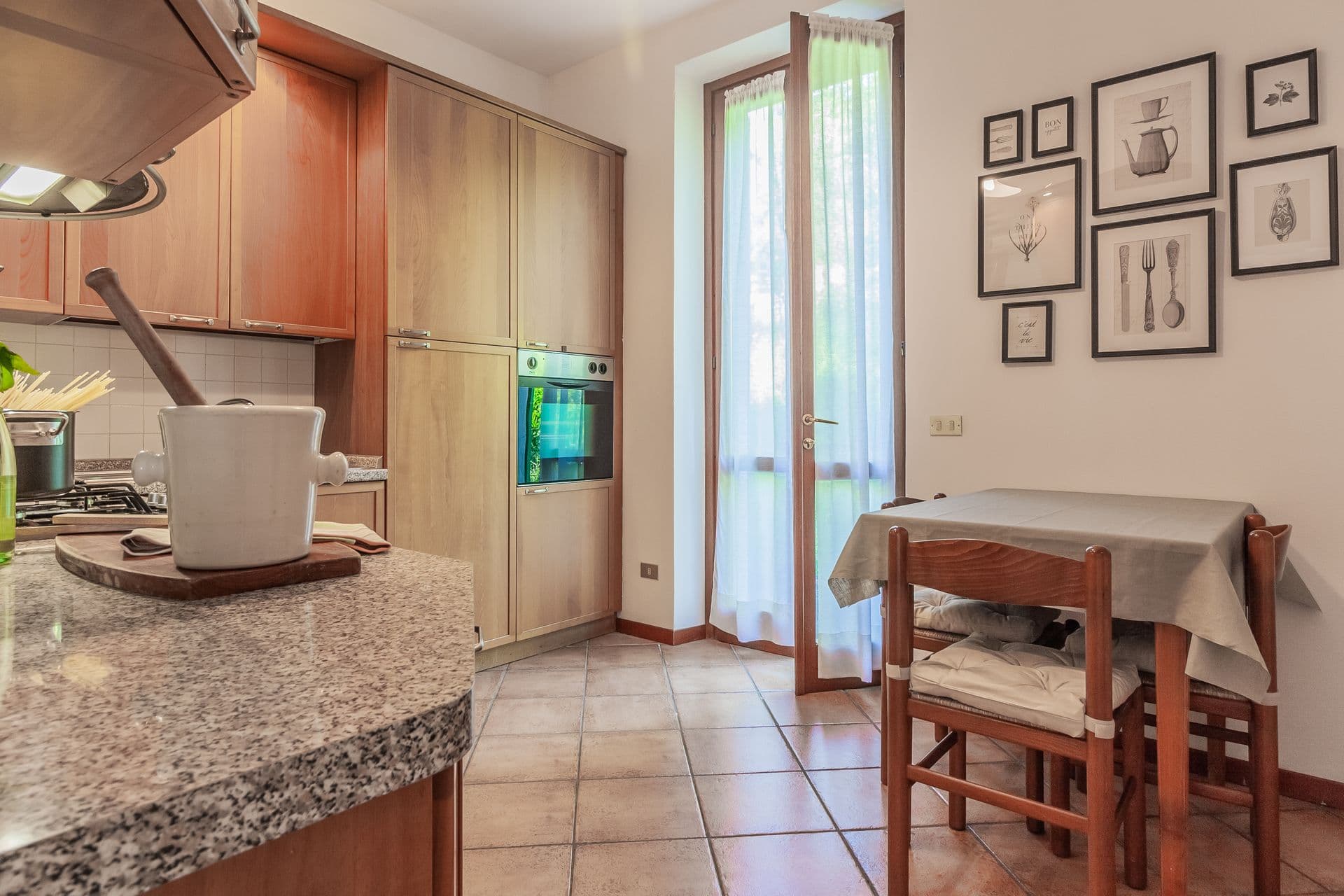 Kitchen counter with granite worktop at So Bellagio villa