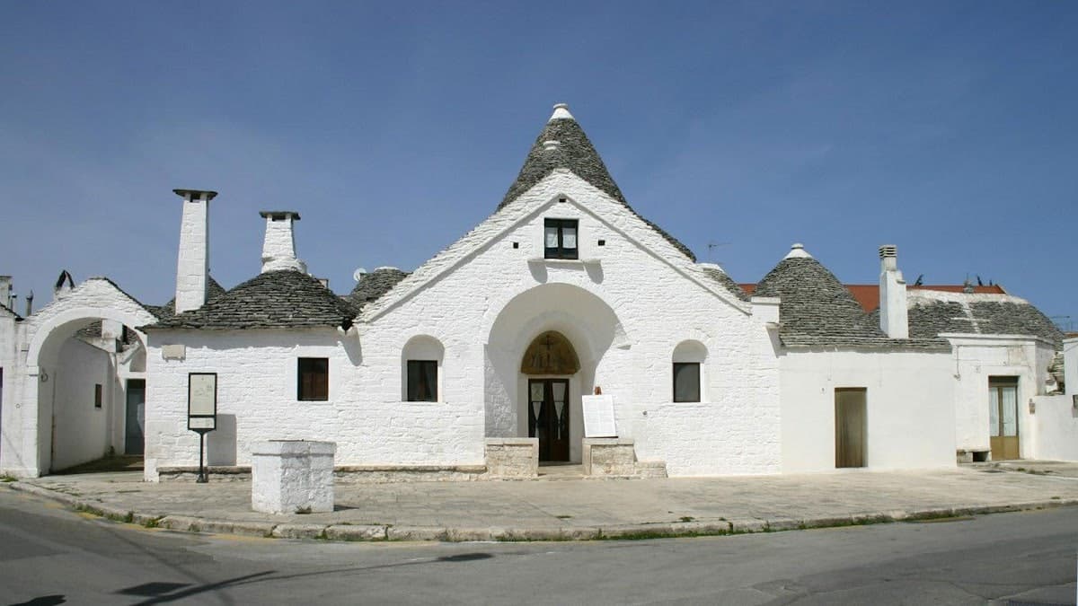 Itria Birdsong street view with traditional trulli homes, Martina Franca, Puglia, Italy