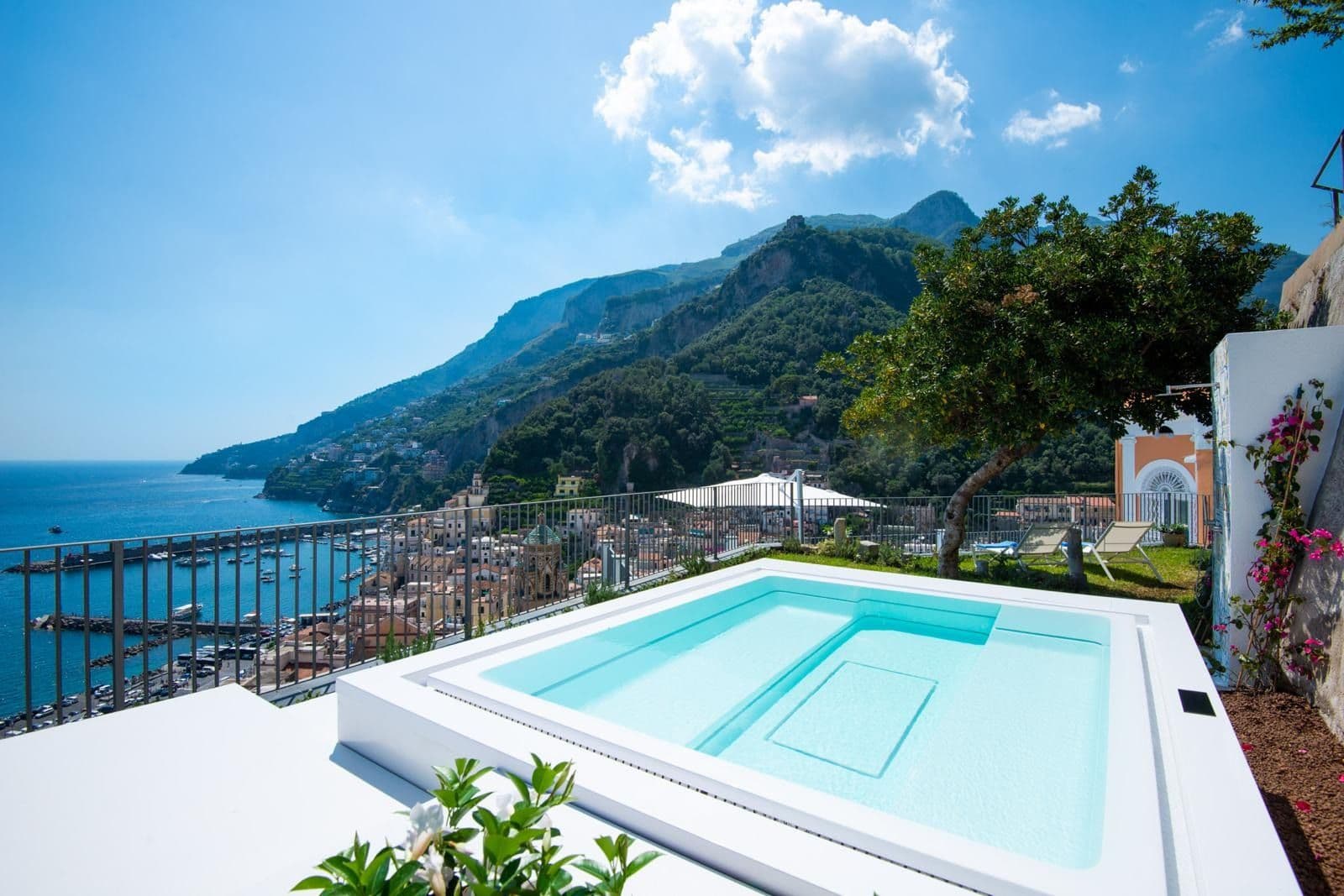 Rooftop plunge pool overlooking the Amalfi coastline and mountains at Riviera Vista Charm