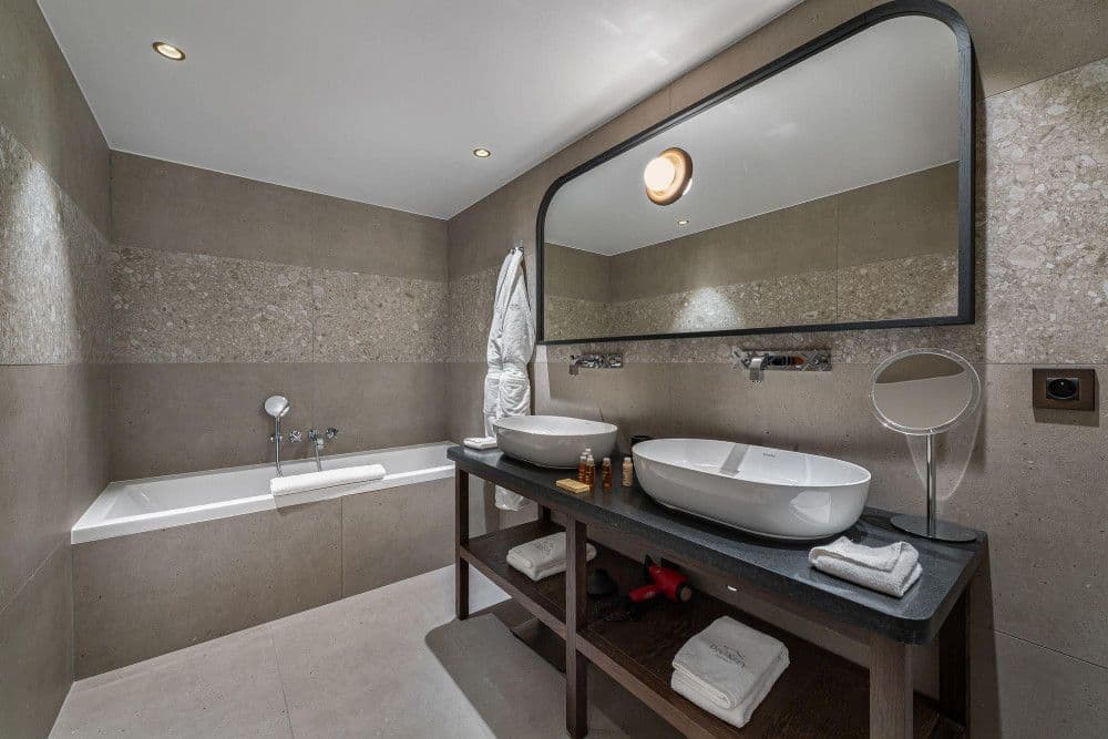 Bathroom with a freestanding bath in stone at Mont d'Arbois 6