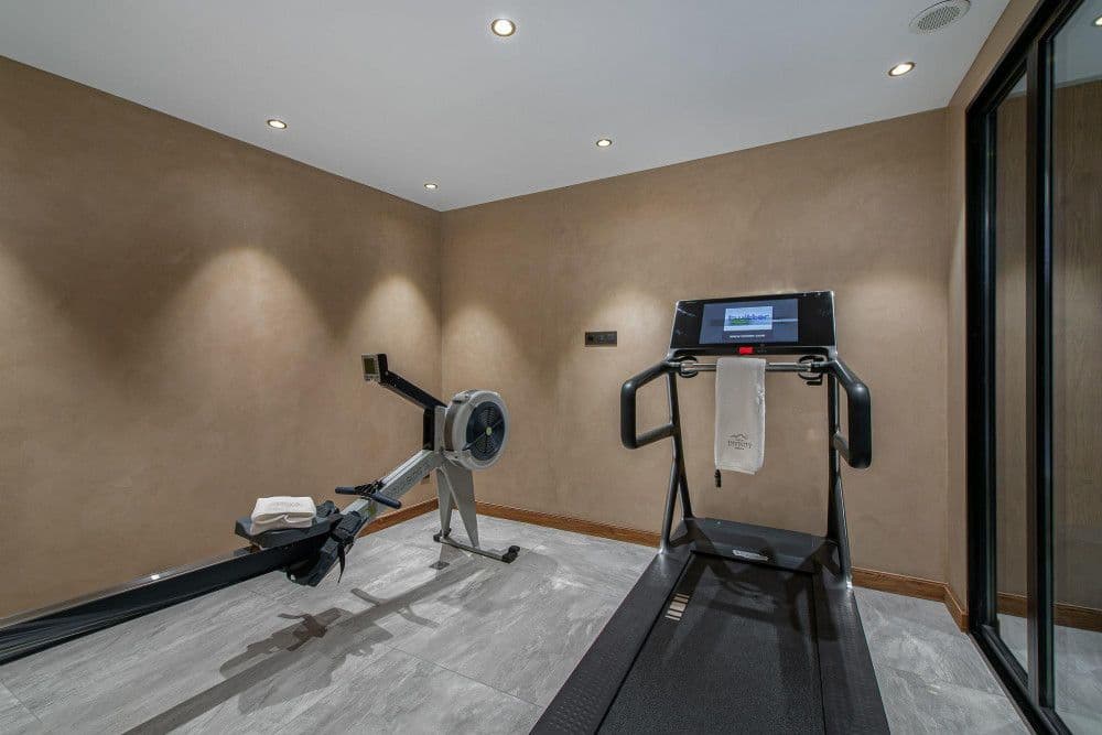 Home gym with cardio equipment at Mont d'Arbois 6