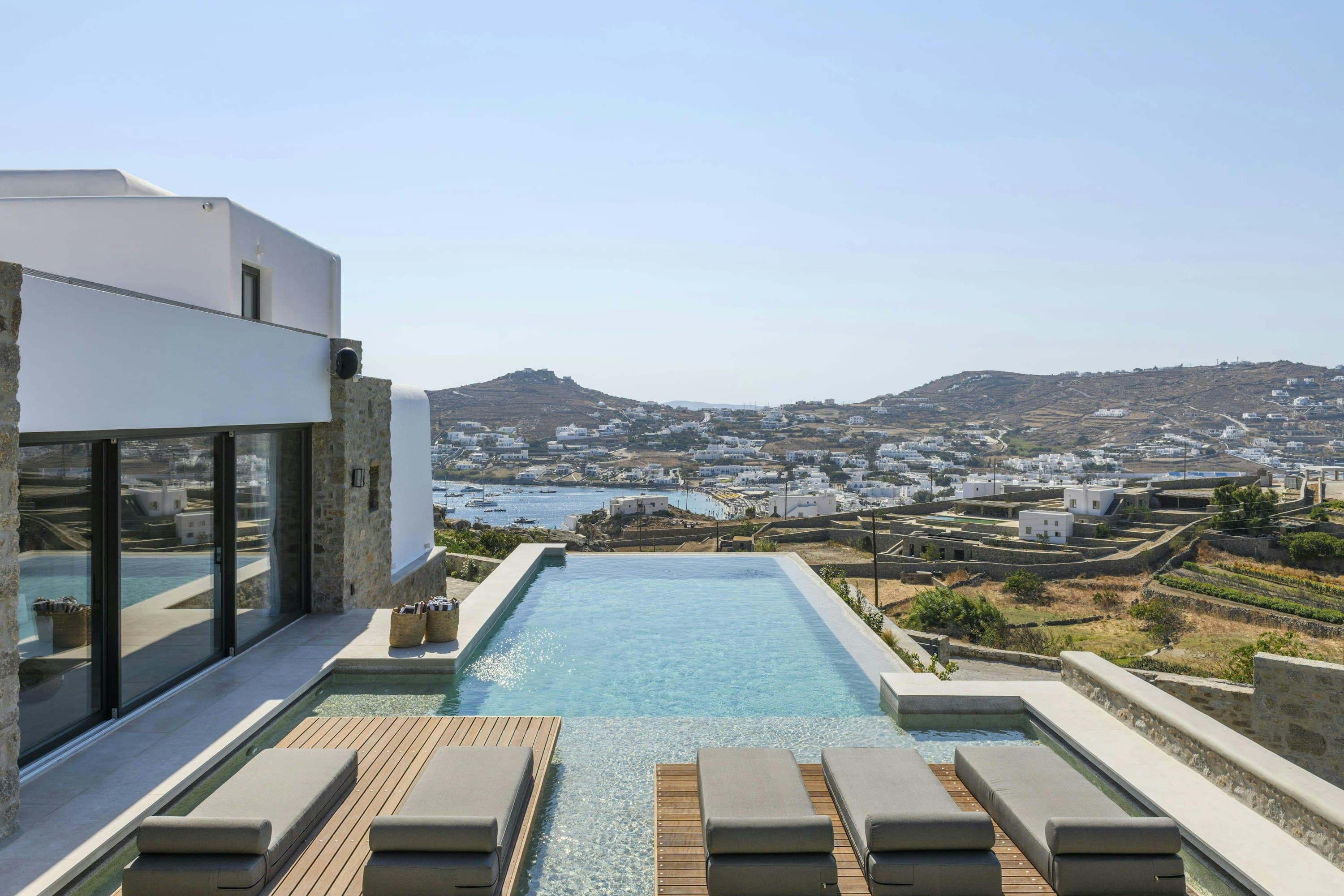 Grecian Sunset villa infinity pool and terrace overlooking Mykonos bay, Psarou, Cyclades Islands, Greece