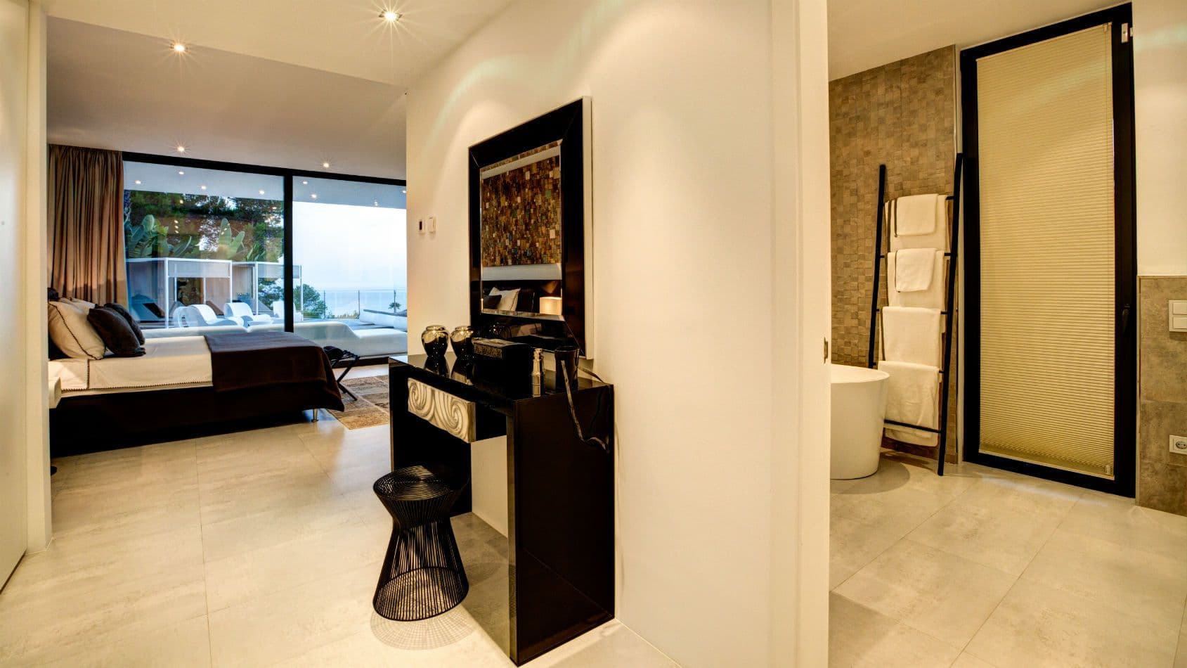 Bedroom suite with an open bathtub and sea view at Baby, You Can Drive My Car, Ibiza