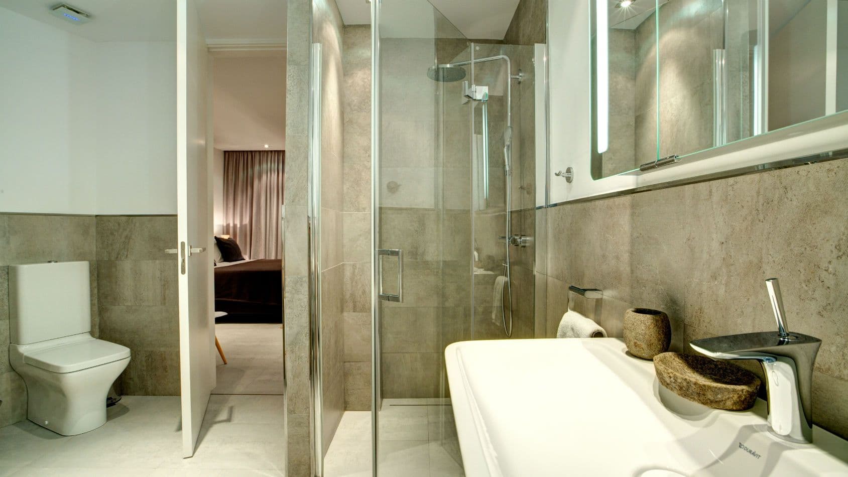 En-suite with a glazed walk-in shower and stone basin at Baby, You Can Drive My Car, Ibiza