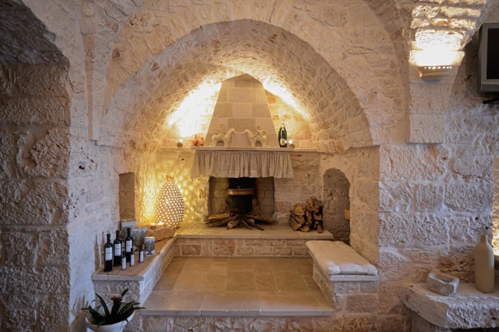 Sublimia fireplace lounge with wine display, Ceglie Messapica, Apulia, Italy